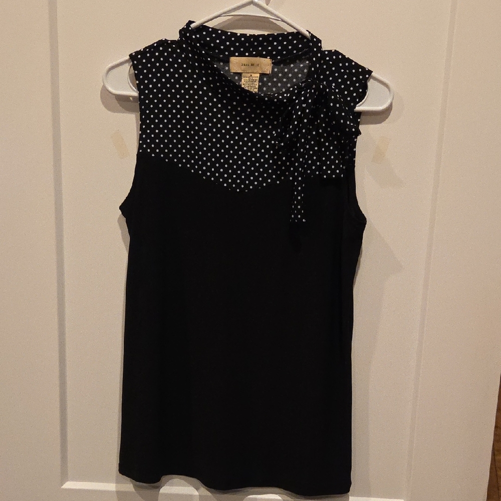 Elegant Black Sleeveless Blouse with Polka Dots